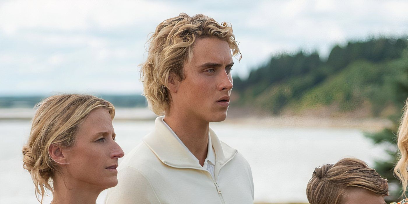 Joseph Zada looks on while standing near the water in We Were Liars