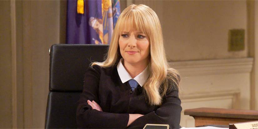 Judge Abby Stone with arms crossed, unimpressed, in Night Court season 3, episode 14