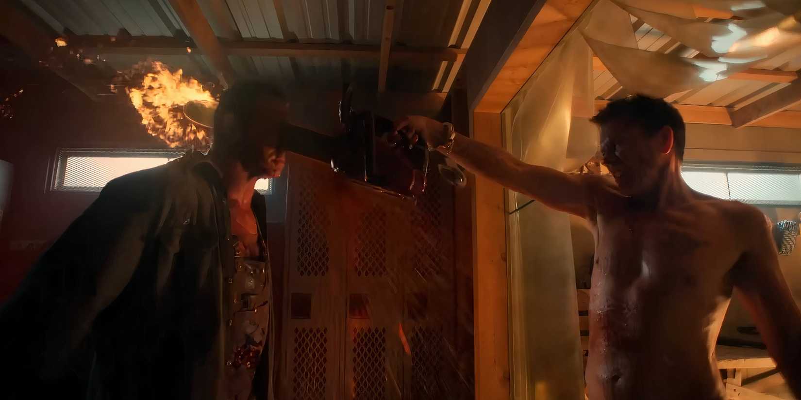 Kevin Bacon's Hub chainsawing someone through the head with the chainsaw on fire in The Bondsman