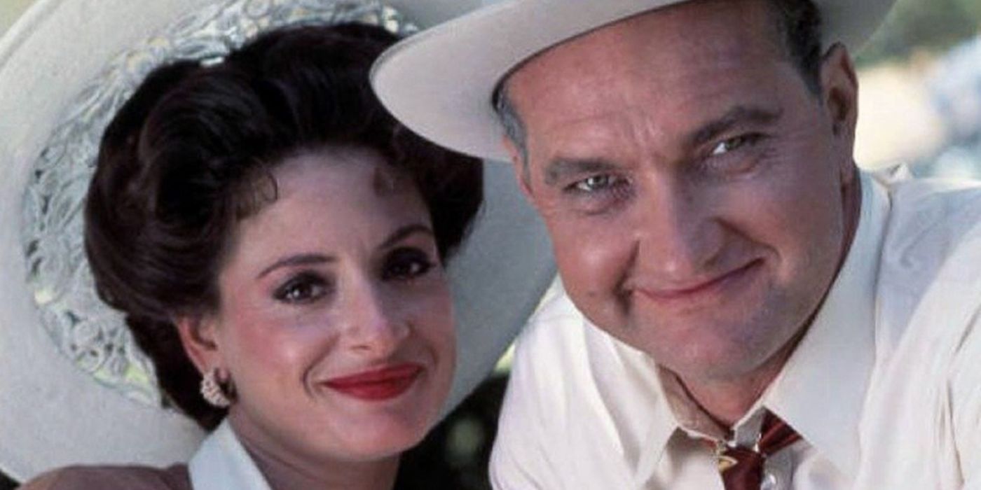 Lady Bird (Patti LuPone) and LBJ (Randy Quaid) smiling in LBJ The Early Years.