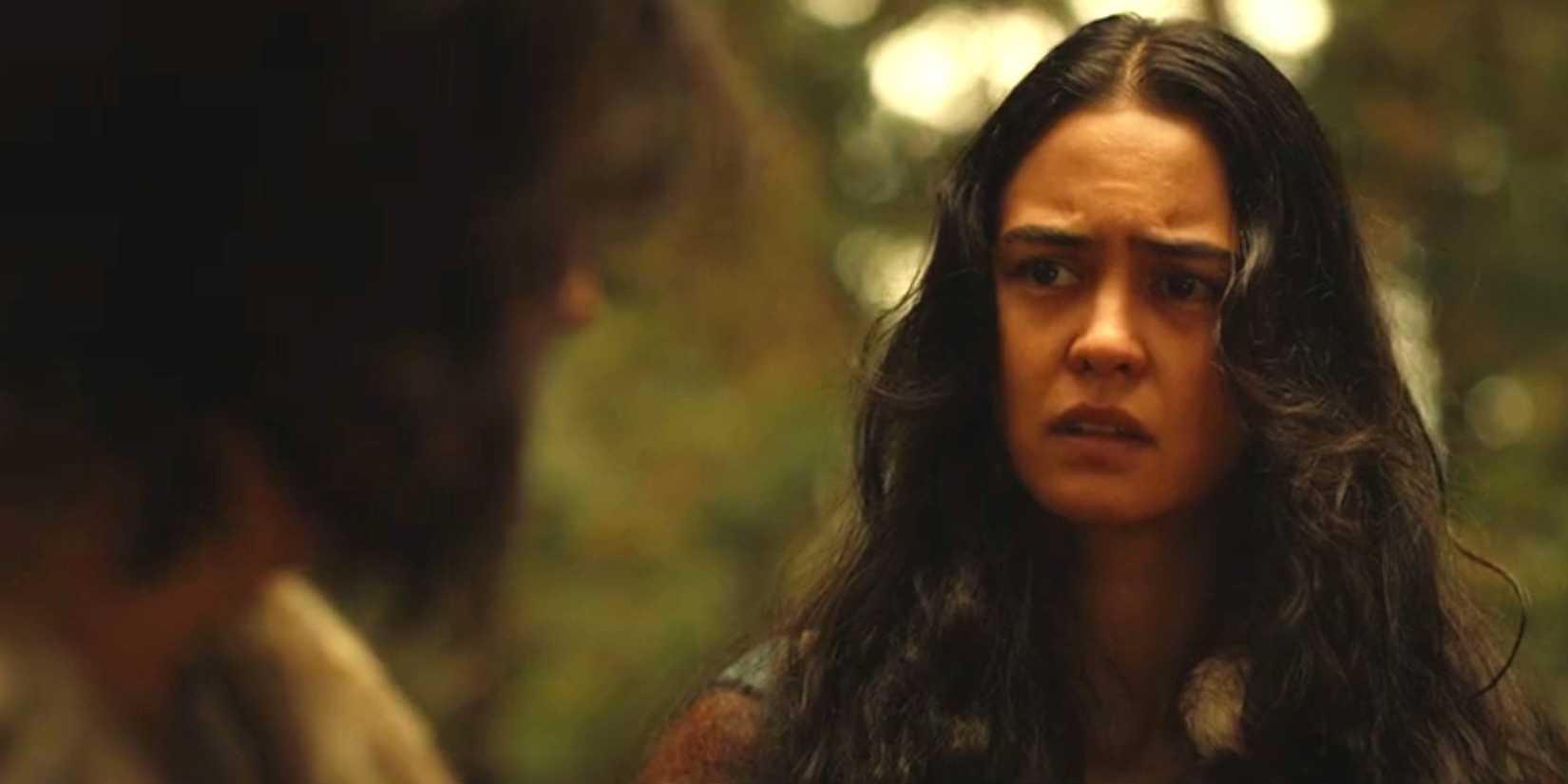 Lottie looking sad and confused talking to Travis in Yellowjackets season 3 episode 9