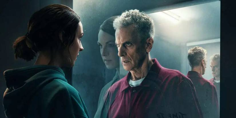 Lucy (Jessica Raine) staring at Gideon (Peter Capaldi) through a window in The Devil's Hour.