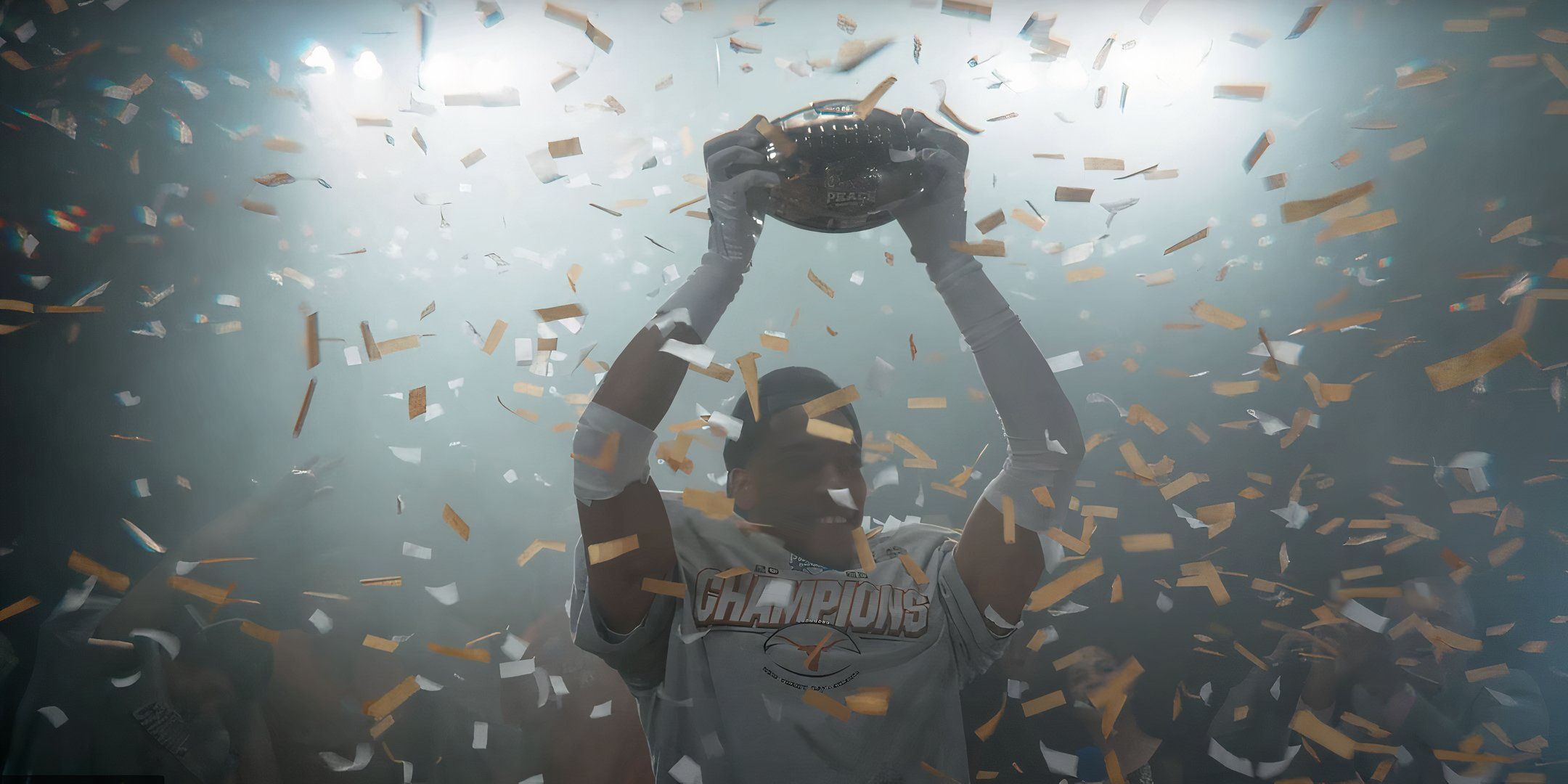 Madden 26 Player holding up football for edition differences cover image temporary