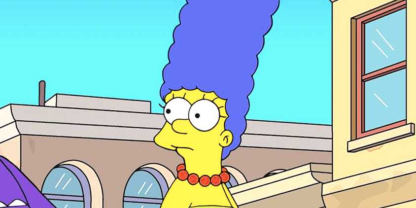 Marge looks concerned standing in the street from The Simpsons season 36 episode 14