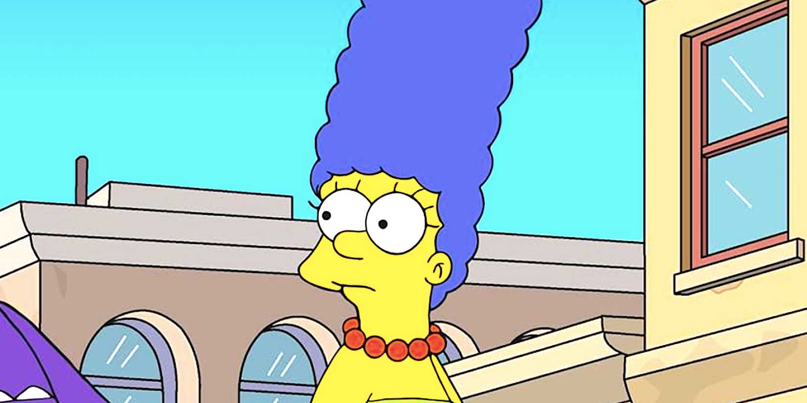 Marge looks concerned standing in the street from The Simpsons season 36 episode 14