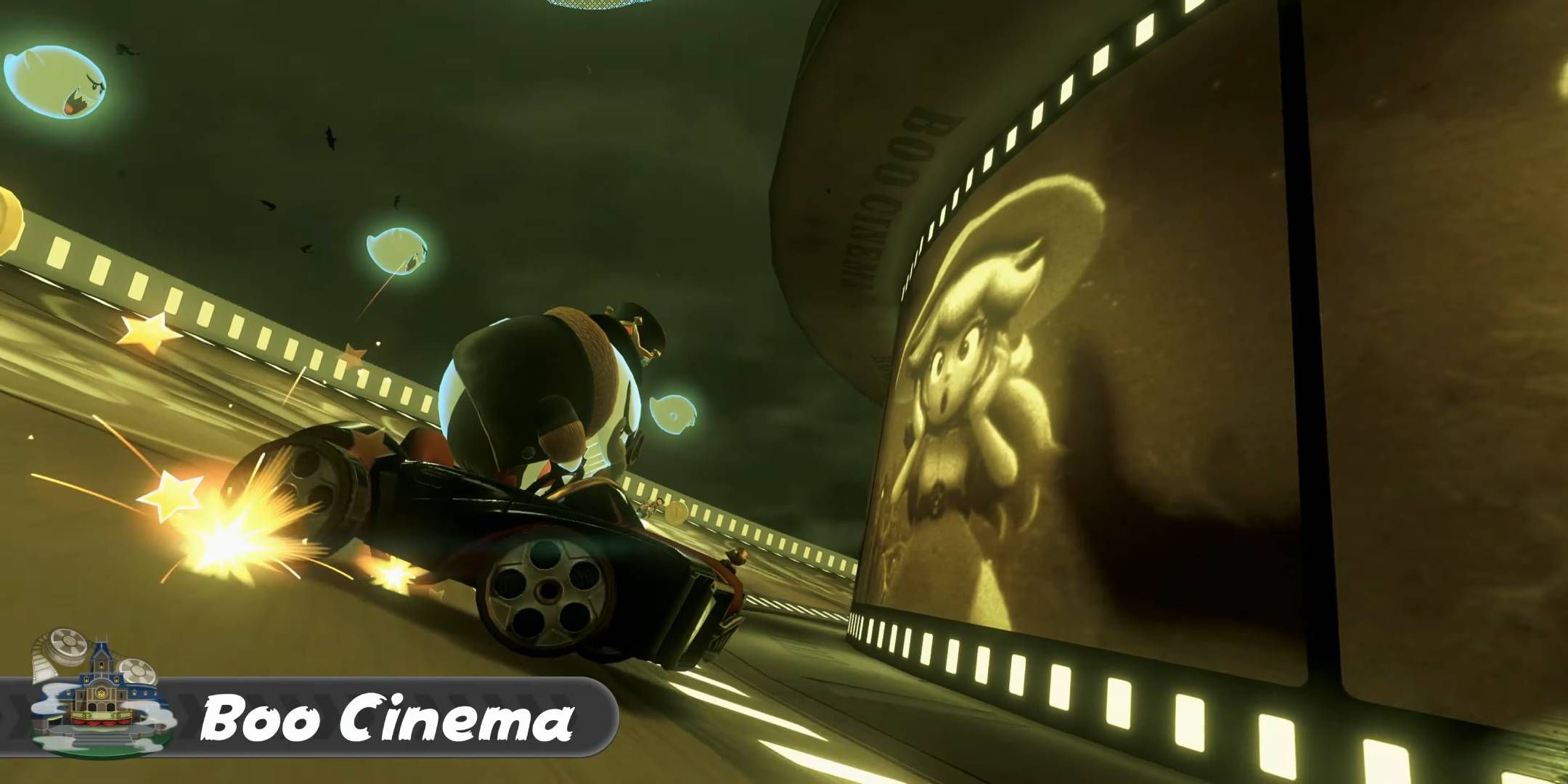 Boo driving a car in the Boo Cinema track with images of Peach in the background in Mario Kart World.
