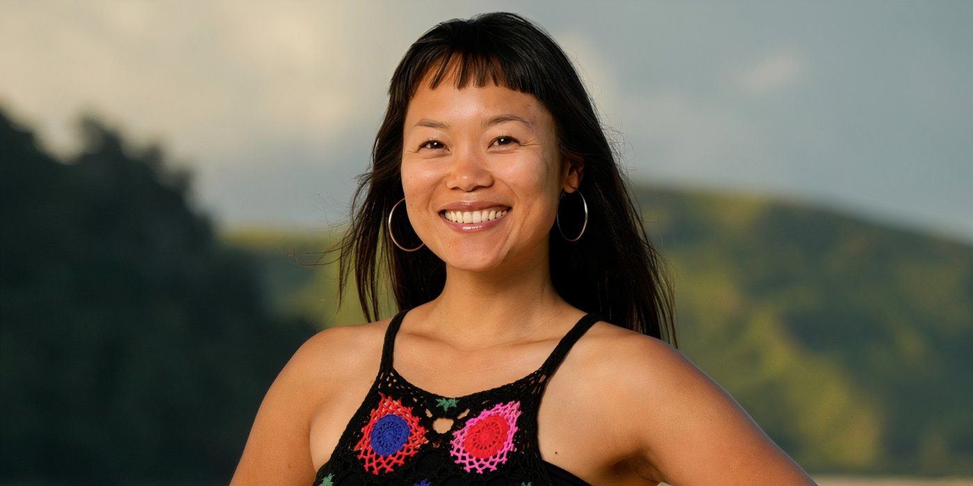 Mary Zheng from Survivor 48 posing in a crocheted dress on the beach.