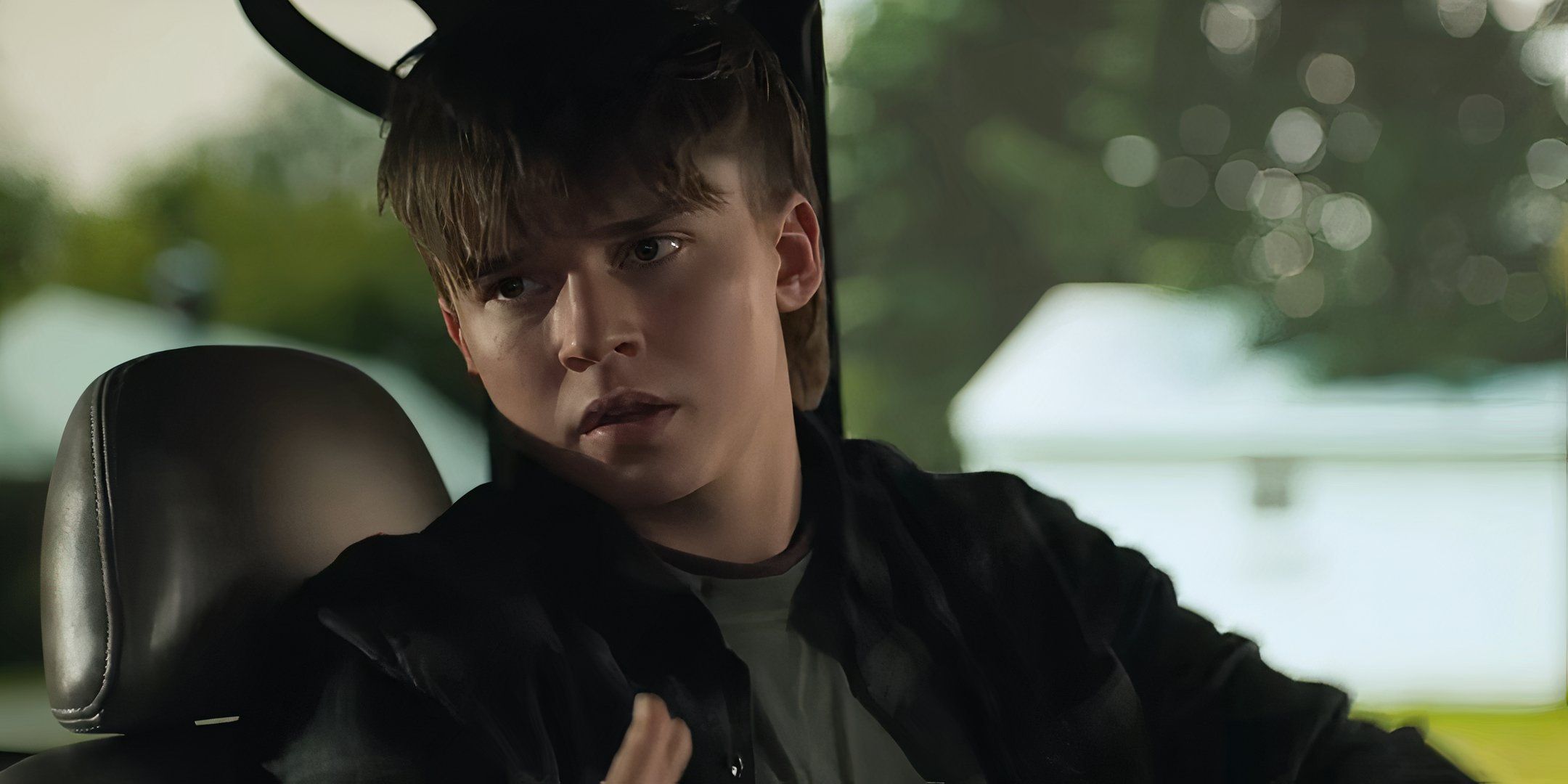 Maxwell Jenkins as Cade looking upset in The Bondsman