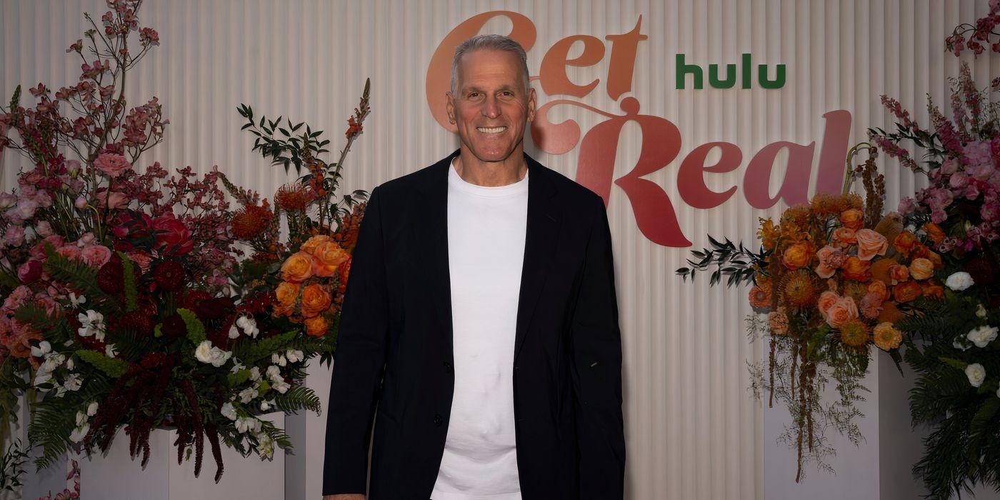The Golden Bachelor&rsquo;s Mel Owens at a press event wearing a black suit jacket and white shirt