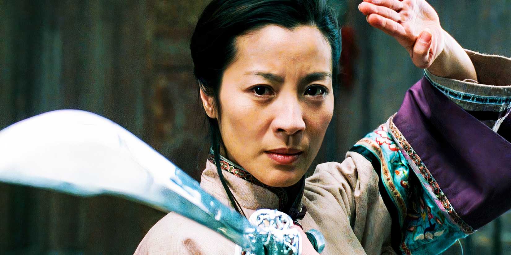Michelle Yeoh holding a sword in Crouching Tiger, Hidden Dragon