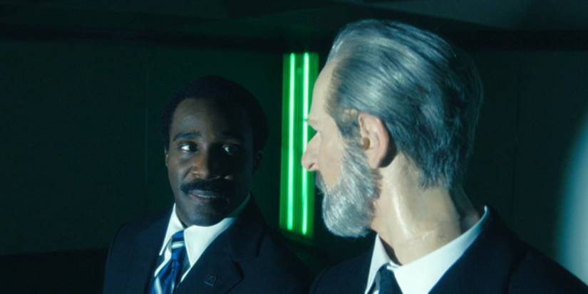 Seth Milchick (Tramell Tillman) looking perturbed at the wax statue of Kier Eagan in Severance season 2, episode 10