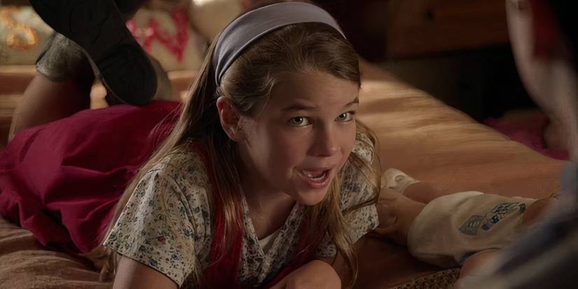 Missy Cooper lying on the bed and talking in Young Sheldon