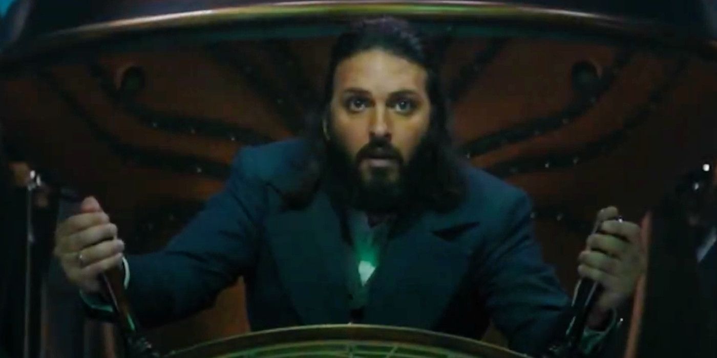 Nautilus Shazad Latif holding steering wheel of ship