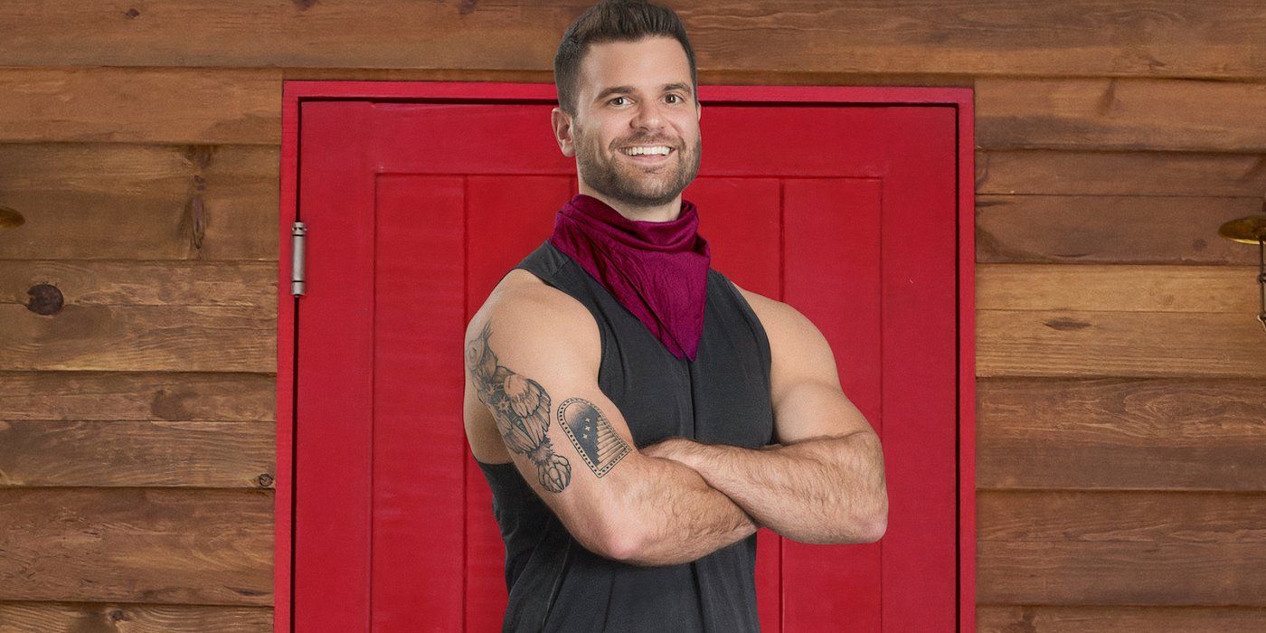 Battle Camp season 1 Nick Uhlenhuth in a black outfit with a wooden structure in the background with a  red door.