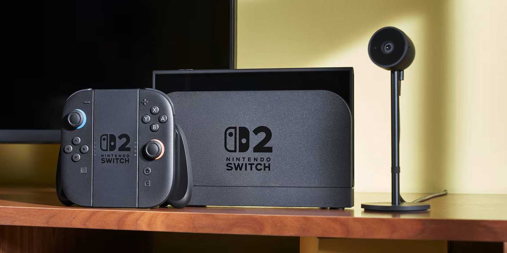 A docked Nintendo Switch 2 next to joy cons and a camera.