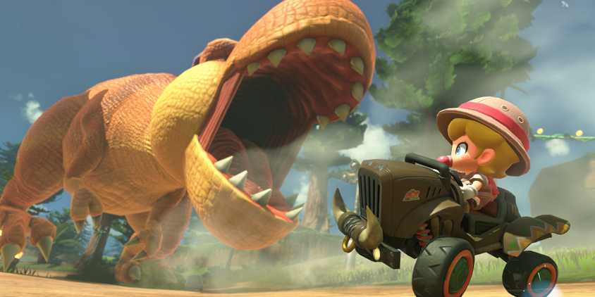 Baby Peach avoids a t-rex in Mario Kart World.