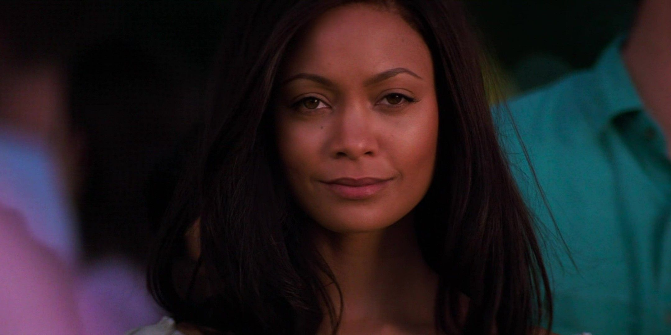 Nyah smiling in Mission Impossible 2 ending
