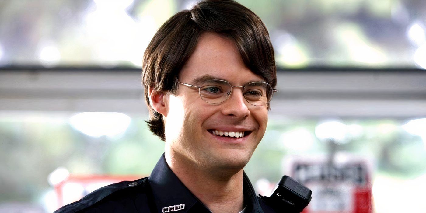 Officer Slater (Bill Hader) grinning in a liquor store in Superbad