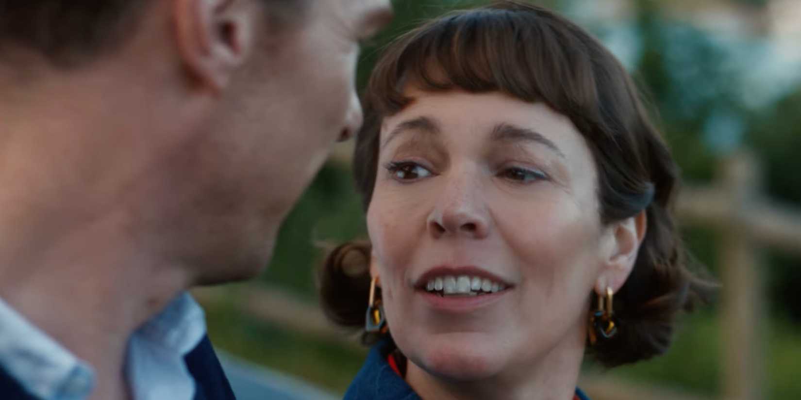 Olivia Colman The Roses looking at Benedict Cumberbatch 