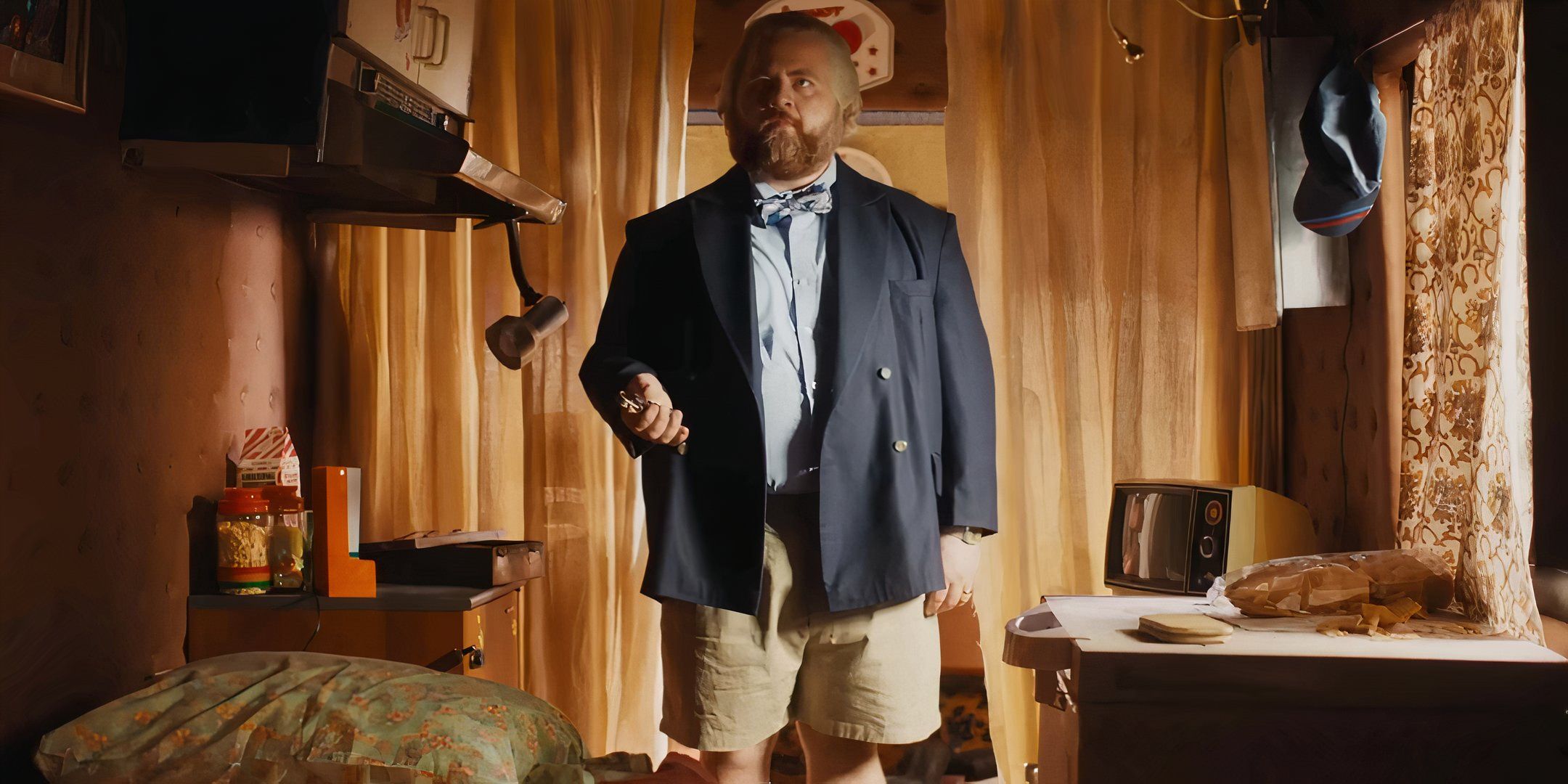 Paul Walter Hauser as Michael standing awkwardly in his RV in The Luckiest Man in America