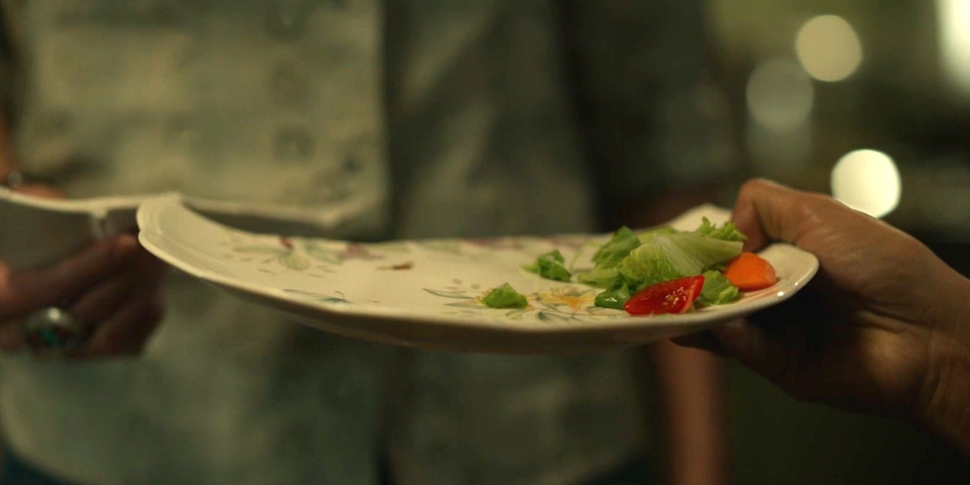 Joe and Emma Leaphorn break a plate in Dark Winds season 3, episode 1