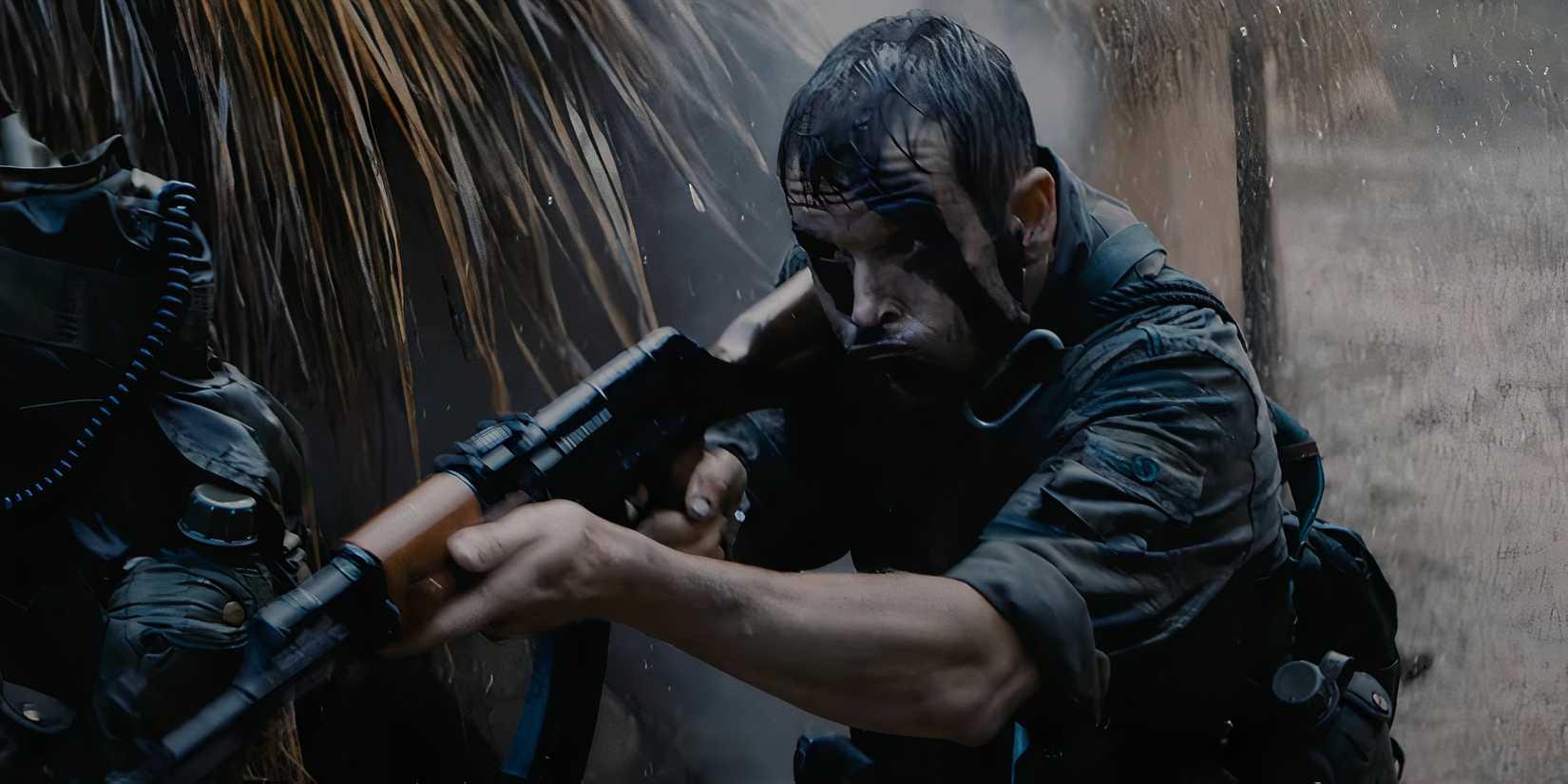 A soldier points a rifle during a battle in a village in Vietnam in Primitive War