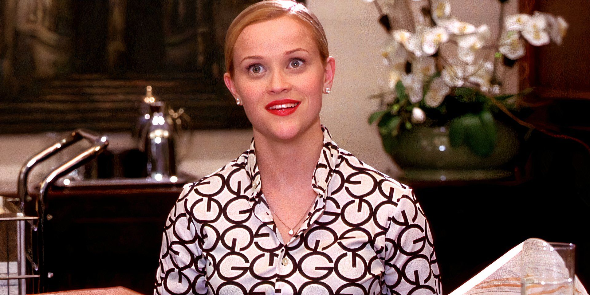 Reese Witherspoon smiling as Elle Woods in Legally Blonde