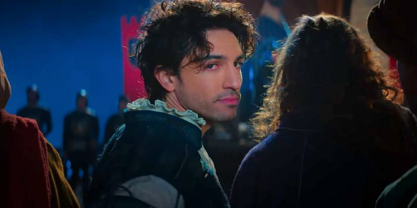 Romeo looking behind him at a party in Juliet and Romeo