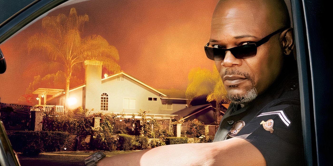 Samuel L Jackson in uniform driving a cop car in front of a Los Angeles home in Lakeview Terrace