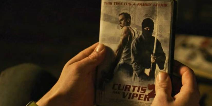 Sarah holds the DVD for Curtis and Viper 2 in The Last of Us season 1