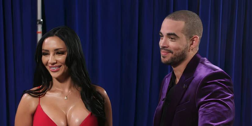 Sophie Sierra in a red dress and Rob Warne in a purple suit on 90 Day: The Last Resort Tell All