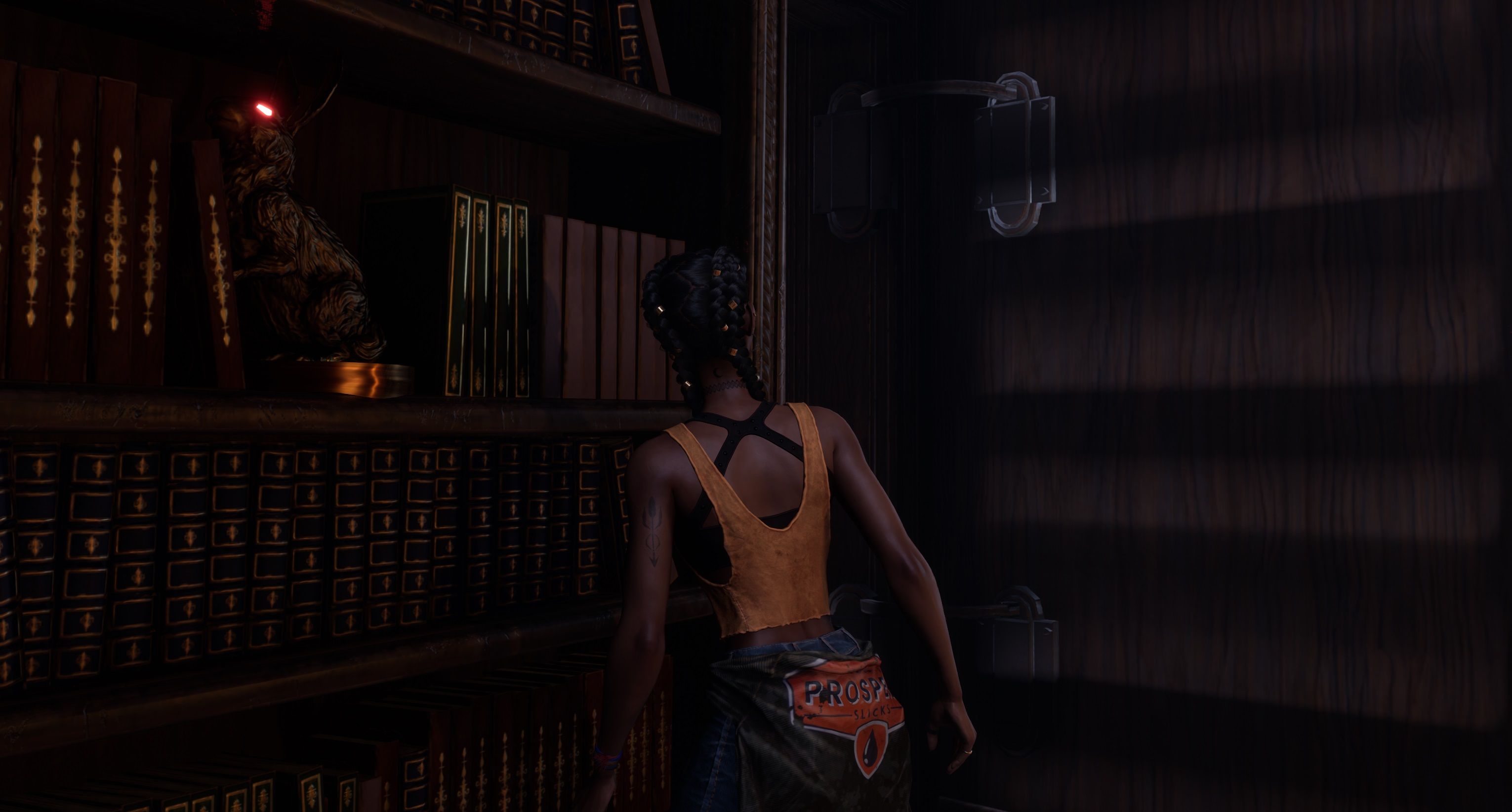 South of Midnight Hazel looking at a bookcase