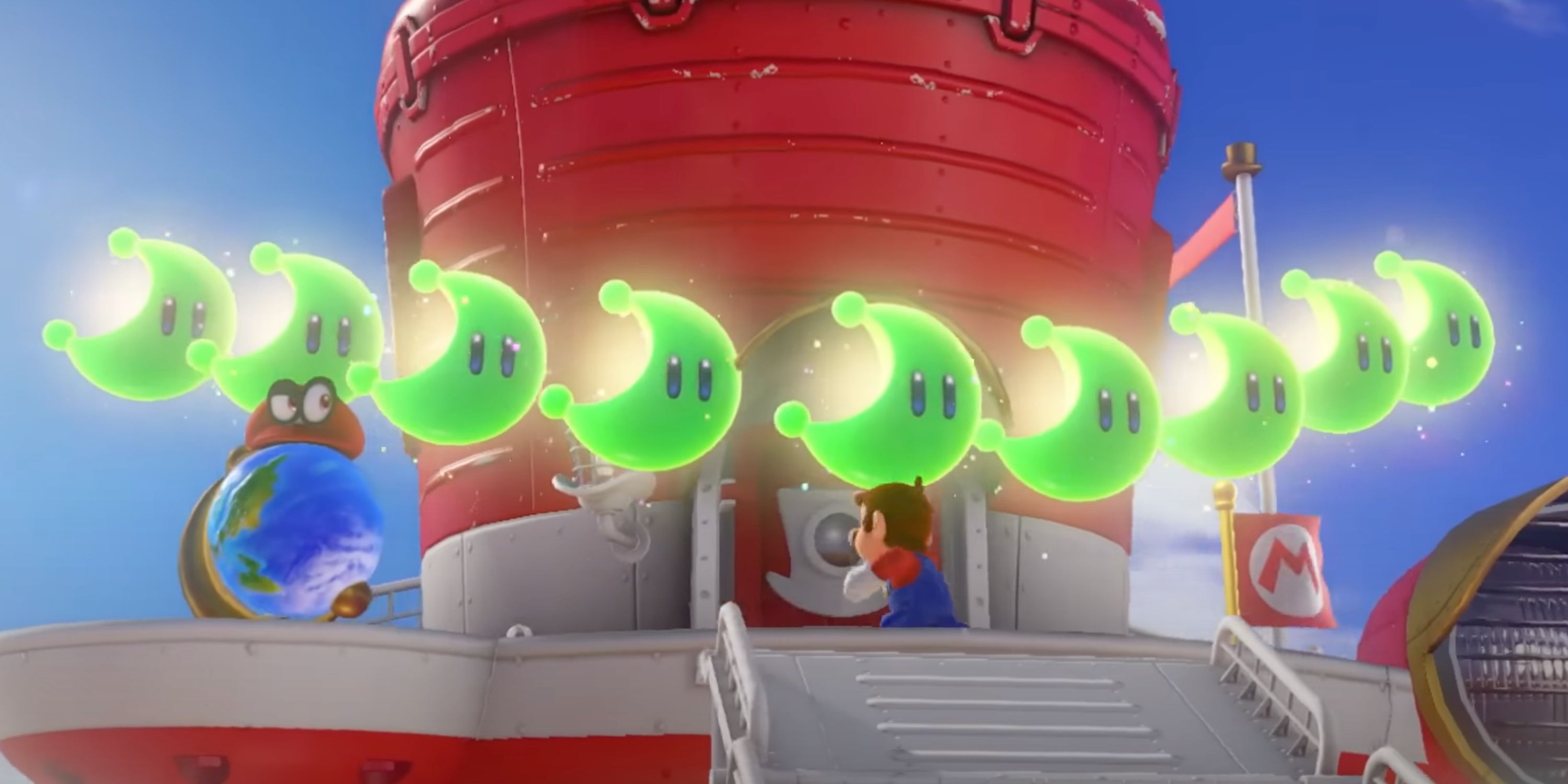 Mario adds an abundance of green Power Moons to the Odyssey ship in Super Mario Odyssey. Cappy looks on while sat on a globe.