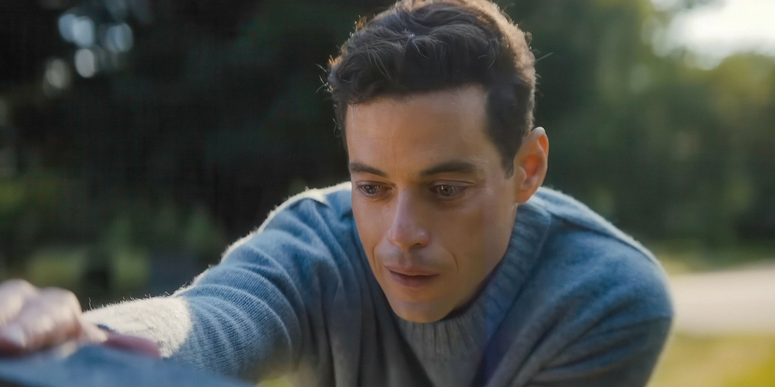 Heller (Rami Malek) with teary eyes in The Amateur
