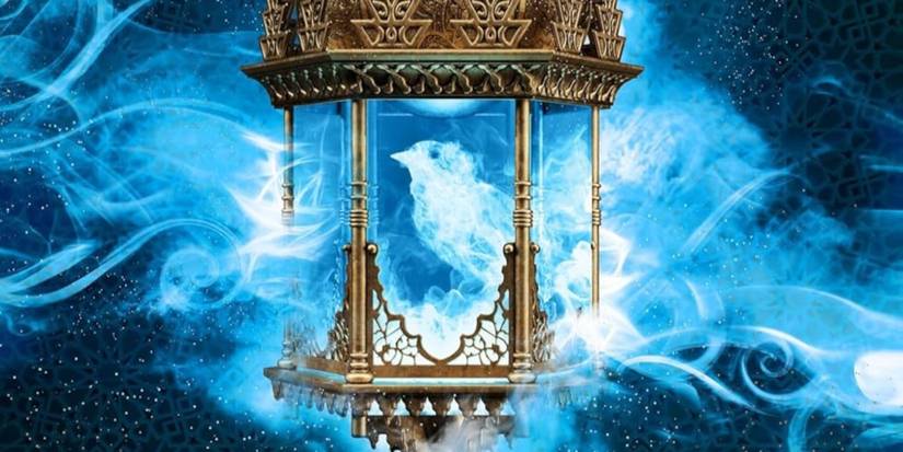 The Ashfire King Cover featuring a golden cage with blue lights forming the shape of a bird inside of it