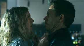 Maryanne (Jennifer Nettles) and Hub Halloran (Kevin Bacon) locking eyes, both terrified in The Bondsman Season 1