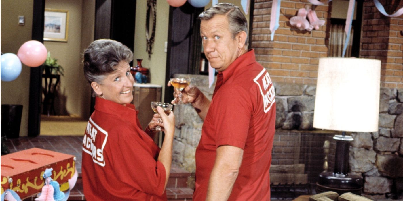The Brady Bunch Alice (L) and Sam (R) in bowling shirts at party