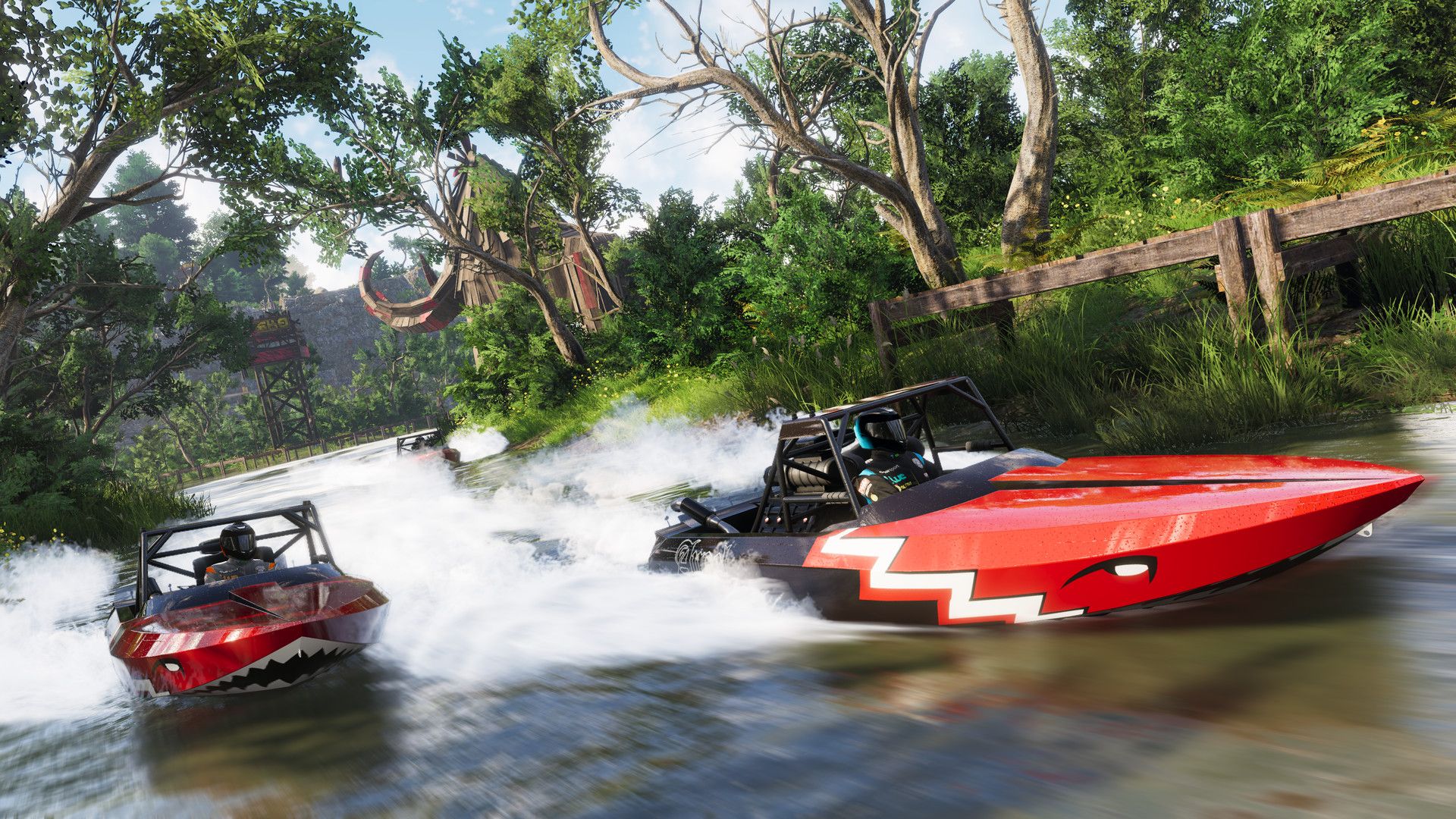 The crew red boats racing through water surrounded by greenery