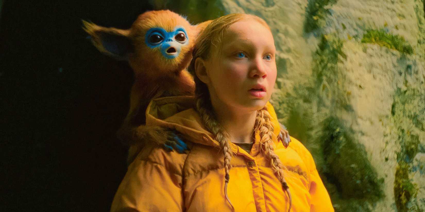 Ochi and Yuri (Helena Zengel) watching in awe in The Legend of Ochi
