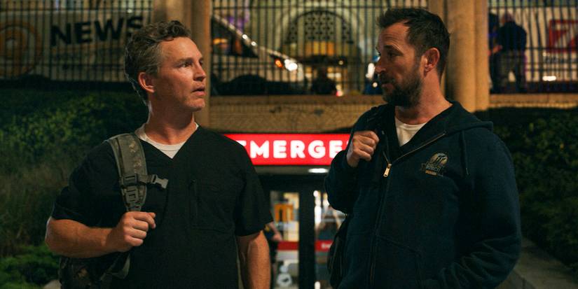 Dr. Robby and Dr. Abbot talking to each other outside of the hospital in The Pitt season 1 episode 15