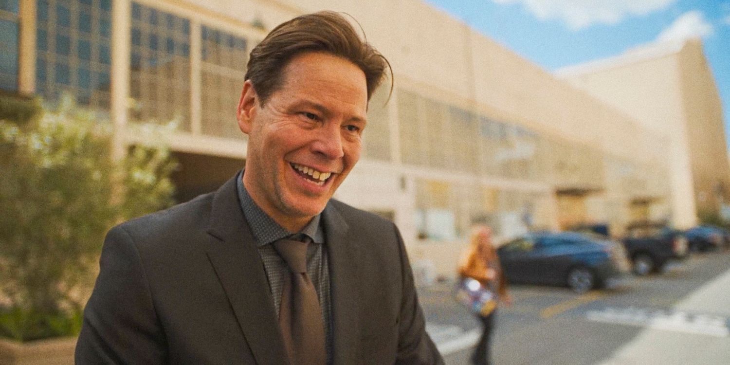 Sal (Ike Barinholtz) smiling in desperation in The Studio Season 1 Episode 5