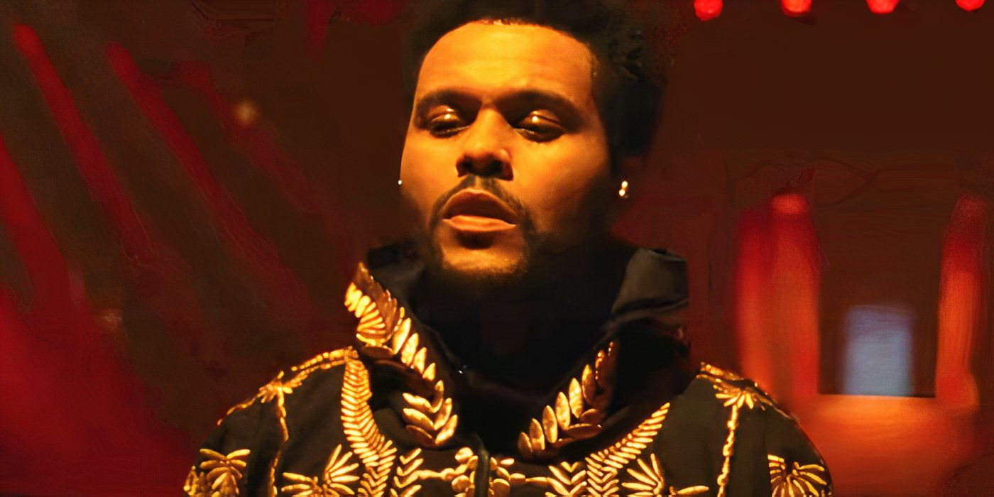 The Weeknd with a robe on stage in Hurry Up Tomorrow