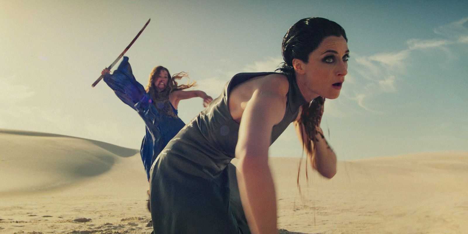 Moiraine Damodred (Rosamund Pike) cuts part of Selene's (Natasha O'Keeffe) neck in The Wheel of Time Season 3 Ep 8