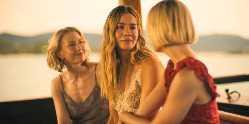 Laurie (Carrie Coon) and Kate comforting Jaclyn (Michelle Monaghan) in The White Lotus Season 3 Ep 8