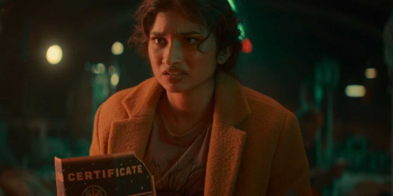 Varada Sethu looking confused as Belinda Chandra in Doctor Who