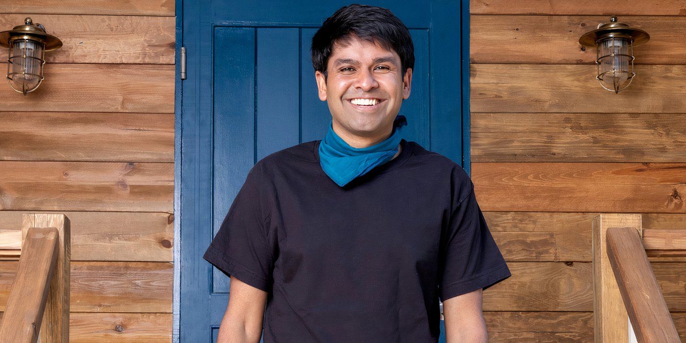 Battle Camp season 1 Shubham Goel in a black outfit and blue neckerchief while smiling