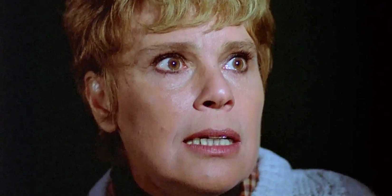 Close up of Pamela Voorhees with eyes wide and mouth parted