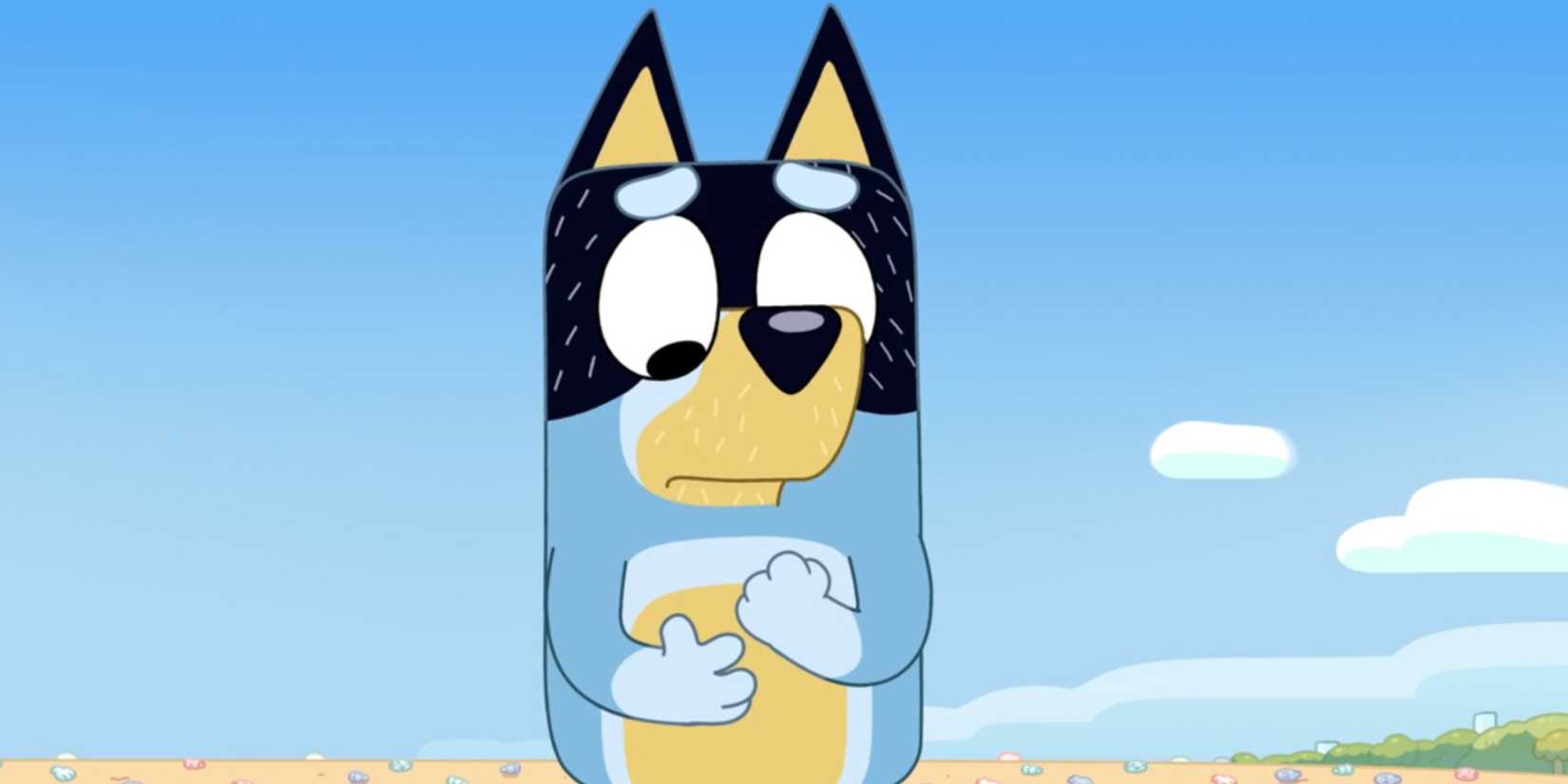 Bandit looking sad as he looks down at his hands
