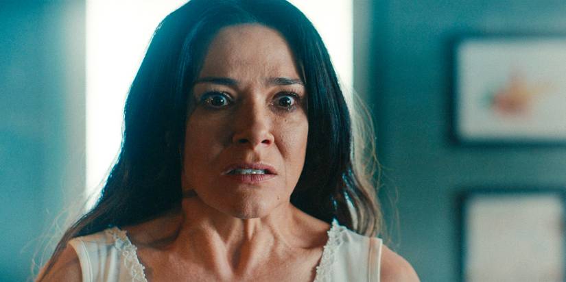 Adult Lottie (Simone Kessell) looking frightened, eyes wide open in Yellowjackets Season 3 Ep 10