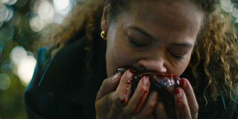 Taissa (Tawny Cypress) eating Van's heart in Yellowjackets Season 3 Ep 10